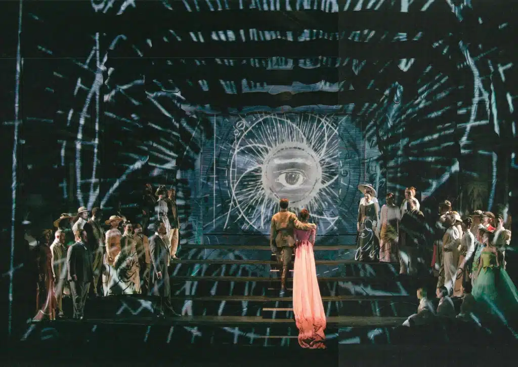 Daniel Behle (Tamino) et Marlis Petersen (de dos) dans LA FLÛTE ENCHANTÉE de W. A. Mozart, mise en scène William Kentridge, direction musicale René Jacobs, Festival d’Aix-en-Provence, 2009. Photo Johan Jacobs. 